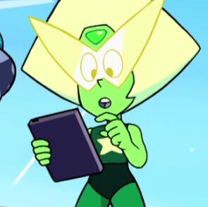 A frame of Peridot from Steven Universe: The Movie. He is holding his tablet in one hand and is looking down at it curiously.